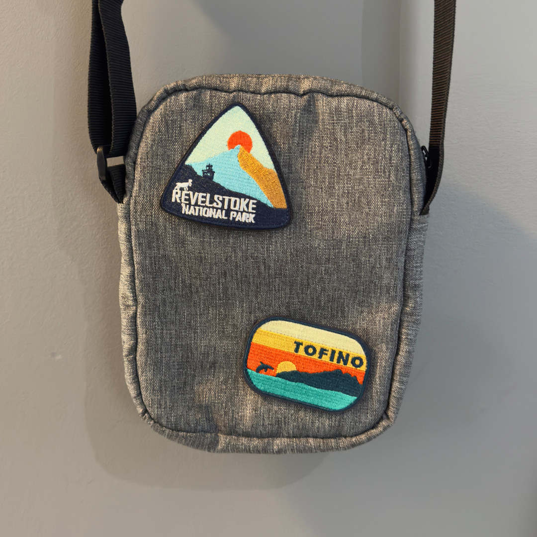 tofino and revelstoke national park travel patch on a shoulder bag