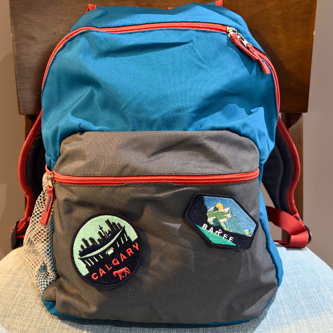 banff national park and calgary travel patch on a backpack