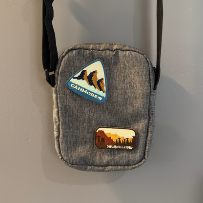 canmore and drumheller travel patch on a shoulder bag