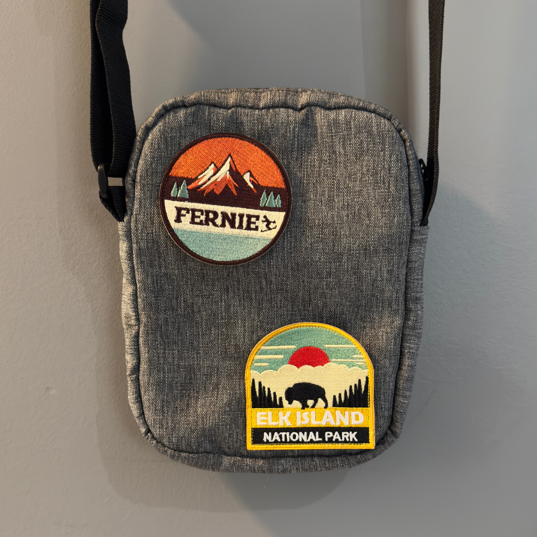 elk island national park and fernie patch on a shoulder bag