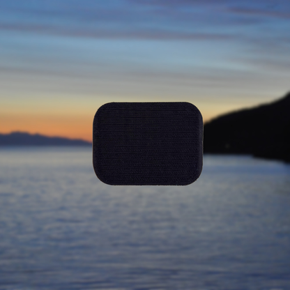 nanaimo patch with velcro against a sunset over water background