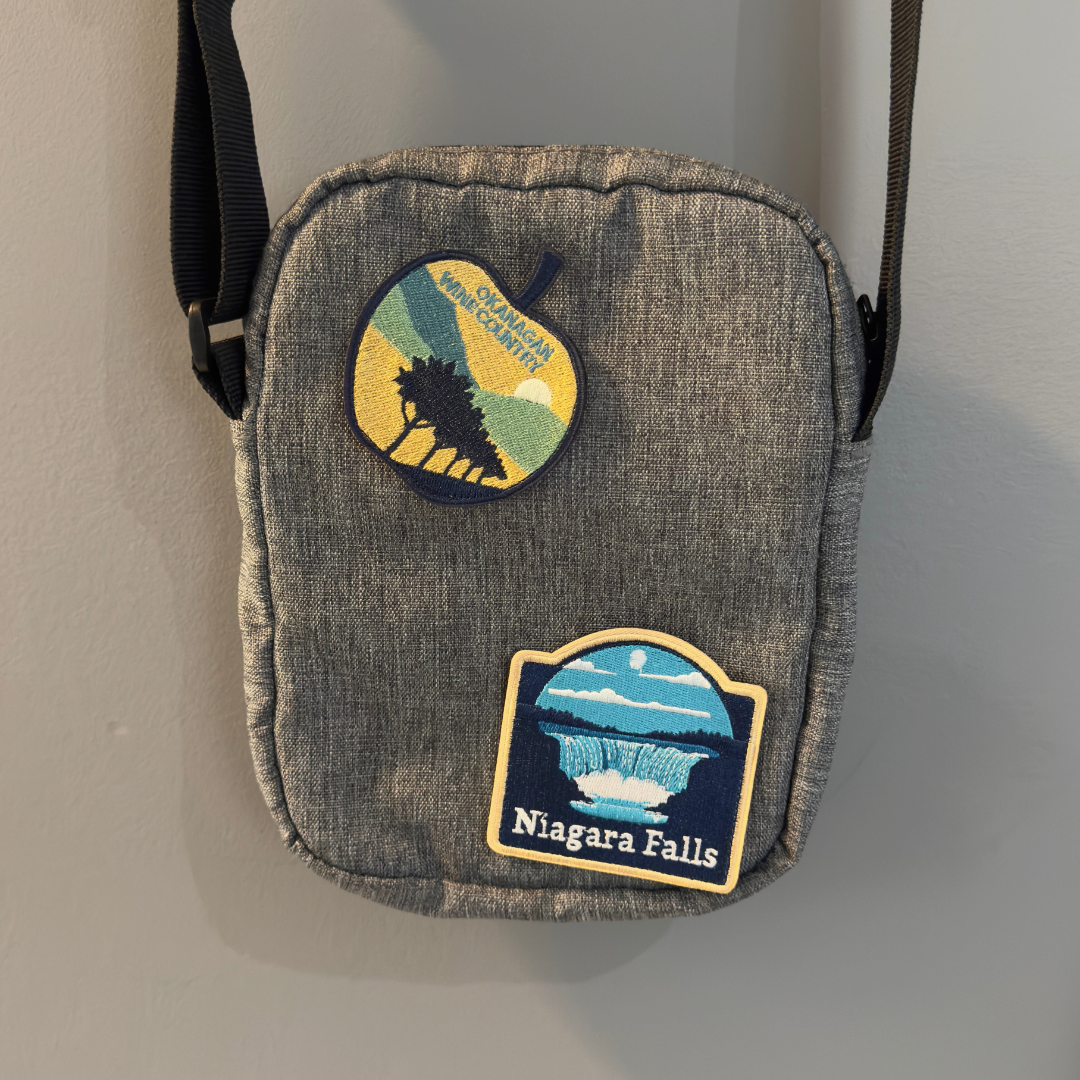 niagara falls and okanagan travel patch on a backpack