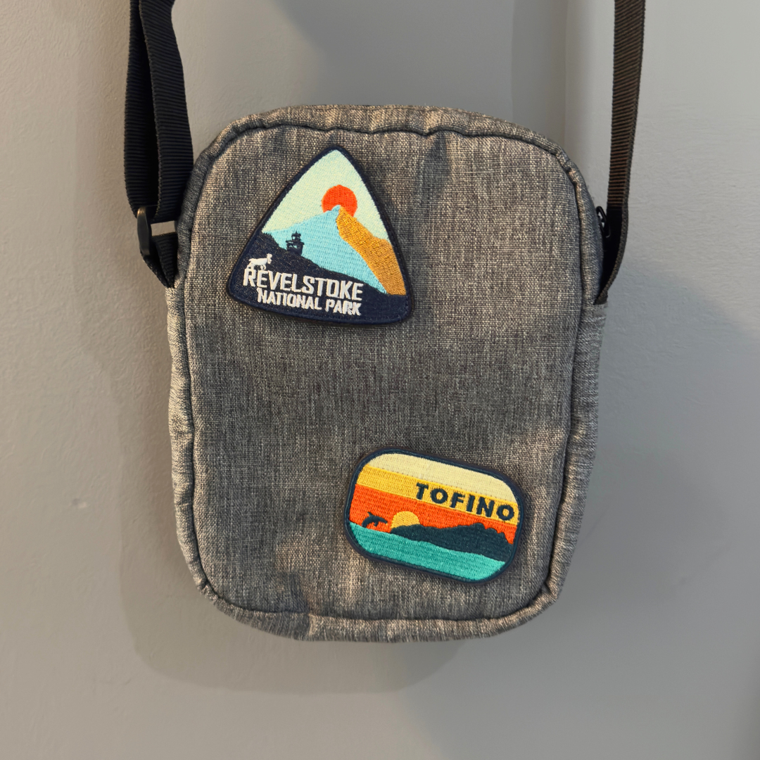 tofino and revelstoke national park travel patch on a shoulder bag
