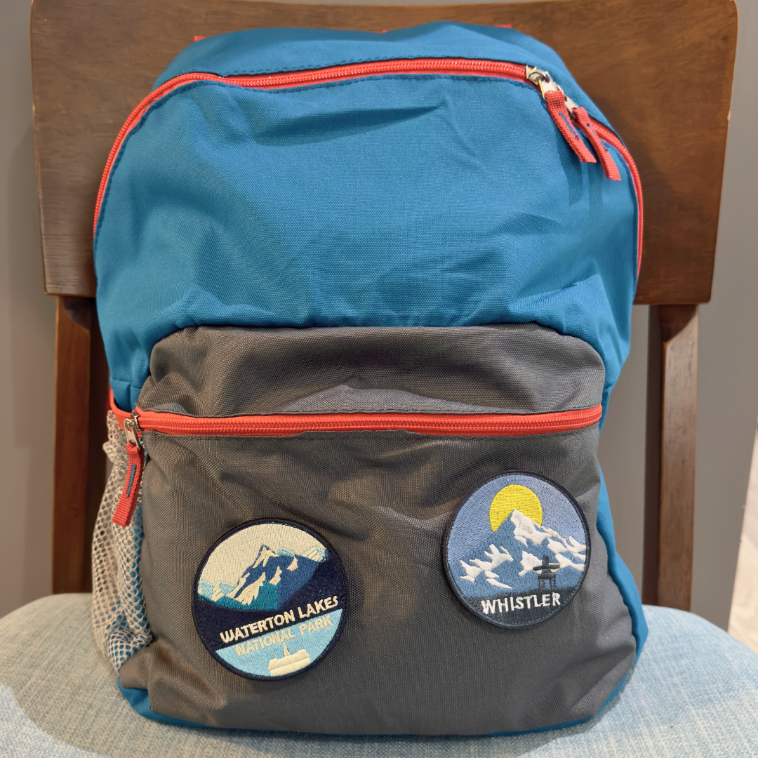 waterton national park and whistler travel patch on a backpack